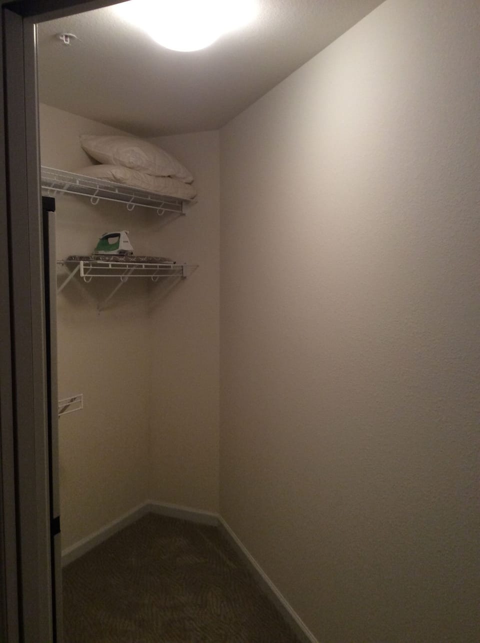 Walk-in closet with master bedroom 