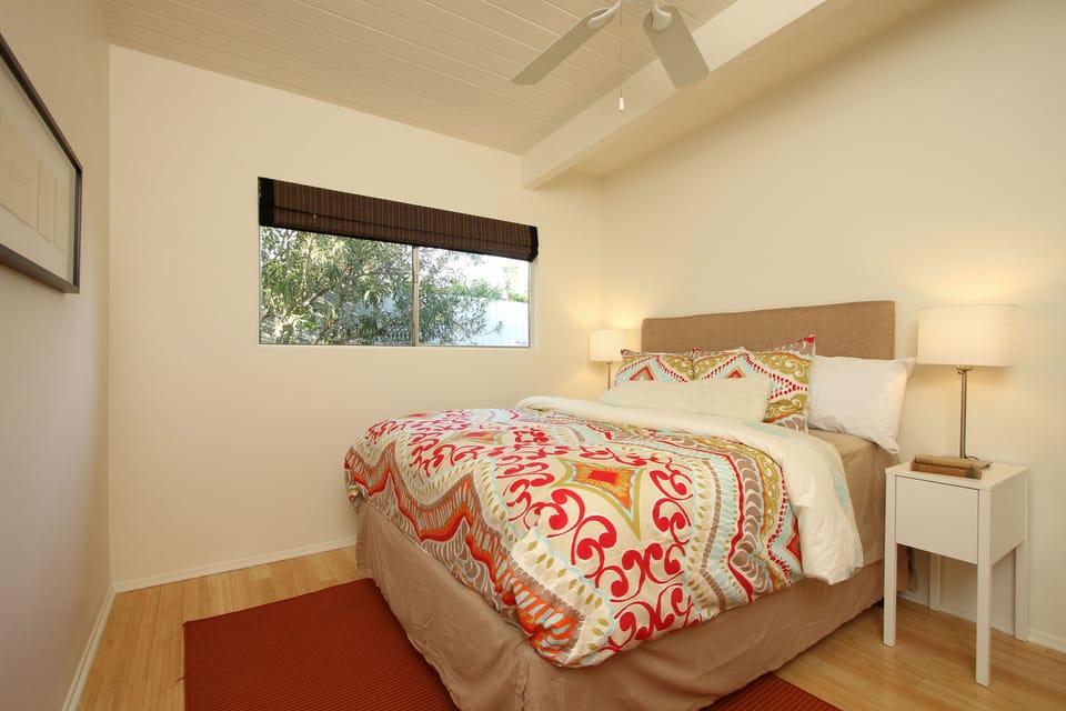 Bedroom 3 has queen bed and its own television.