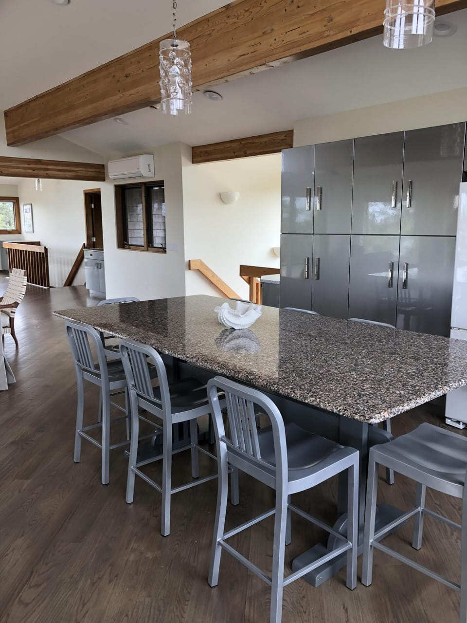 Kitchen area and island on top floor of home. Seating for 8