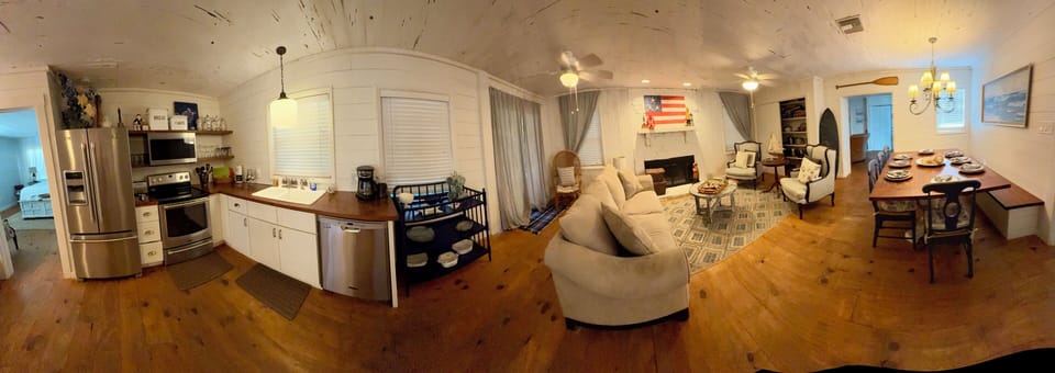 Large open living, kitchen, and dining area.