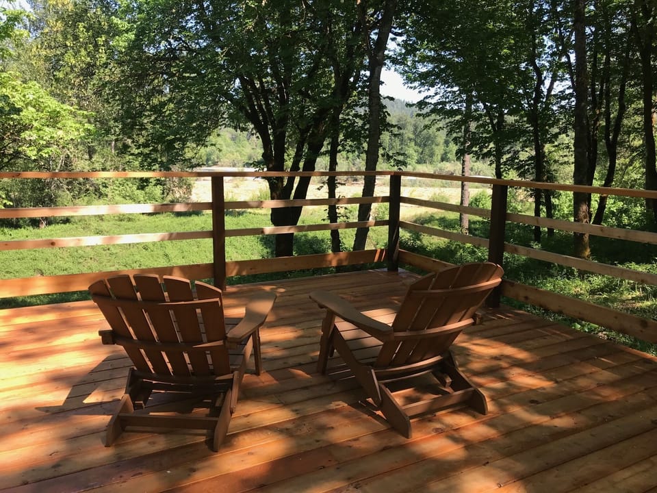 Afternoon river view from the deck with ample seating