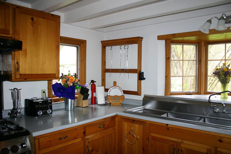 Big sinks, Wolf range, and service for 10 guests