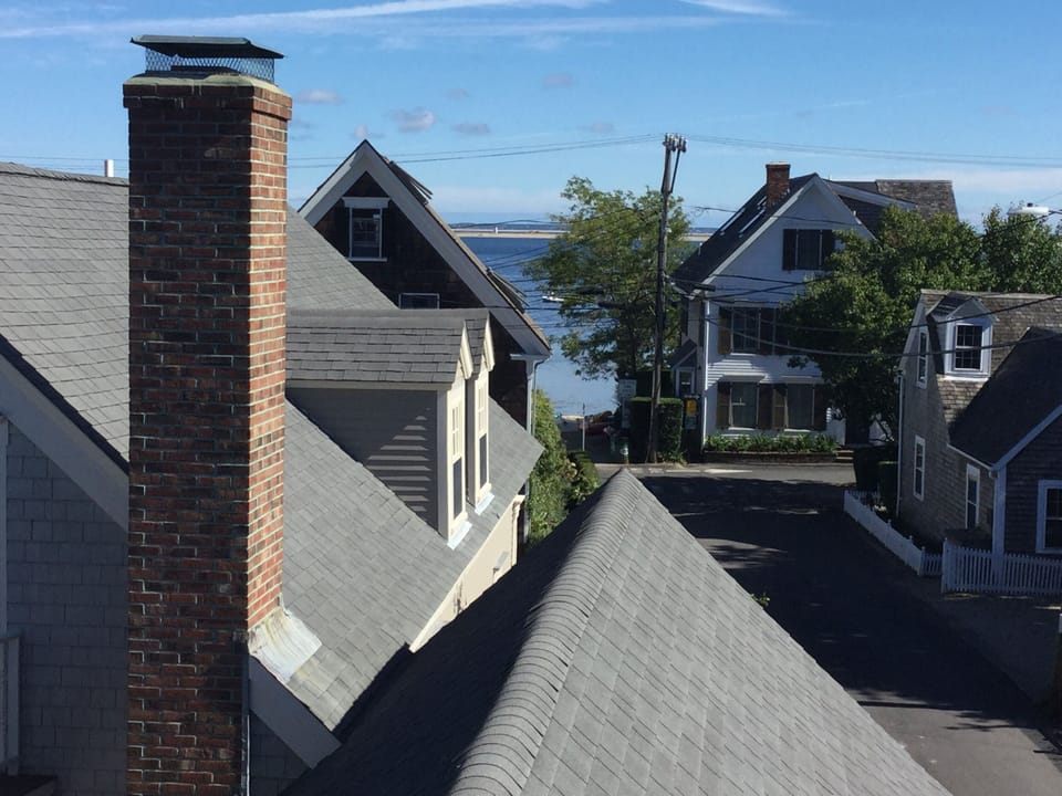 View of the lighthouse at the tip of Cape Cod from the balcony off the bedroom