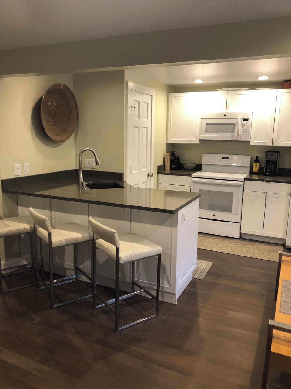 Full kitchen with washer dryer combo and plenty of counter space