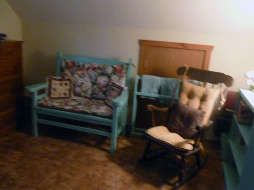 Sitting area and library in upstairs bedroom