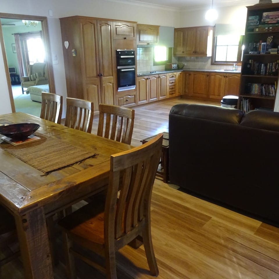 Dining / family area and kitchen with double oven.
