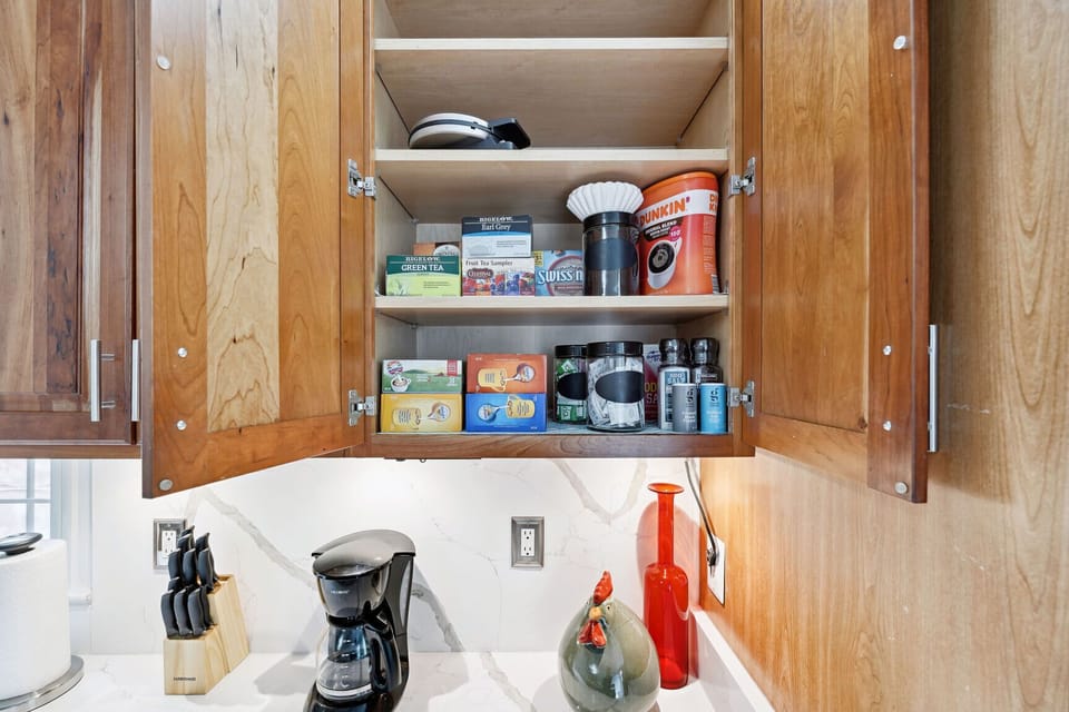 Curated coffee & tea bar stocked with premium blends and cozy touches.