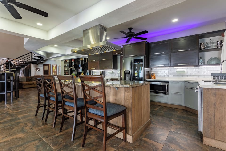 The kitchen is the heart of the home! There is plenty of space for all to gather