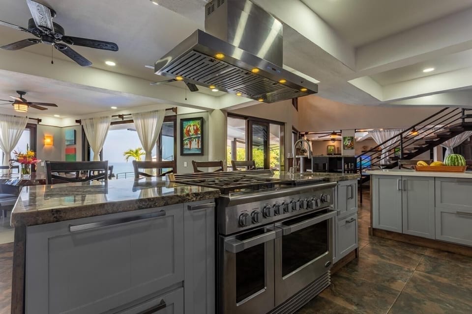 A stunning open kitchen designed to keep you connected to all of the action!