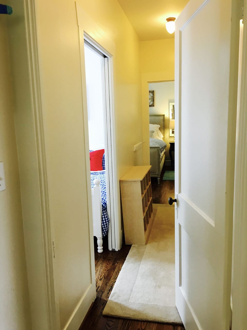 Hallway with door that separates two of the bedrooms so you have lots of privacy