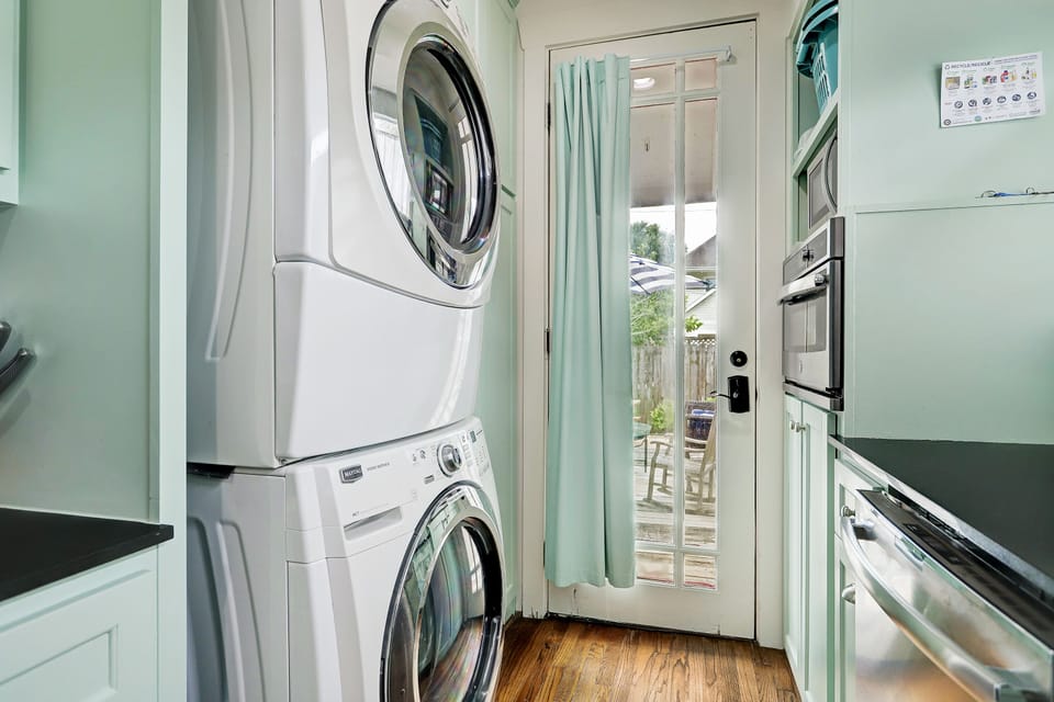 Washer/Dryer in kitchen. Note Microwave & 2nd oven on the right