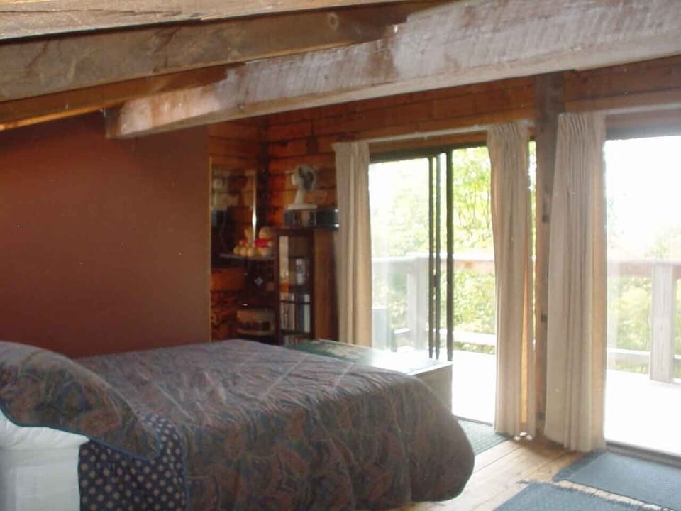 Master bedroom and upper deck (looking Southeast