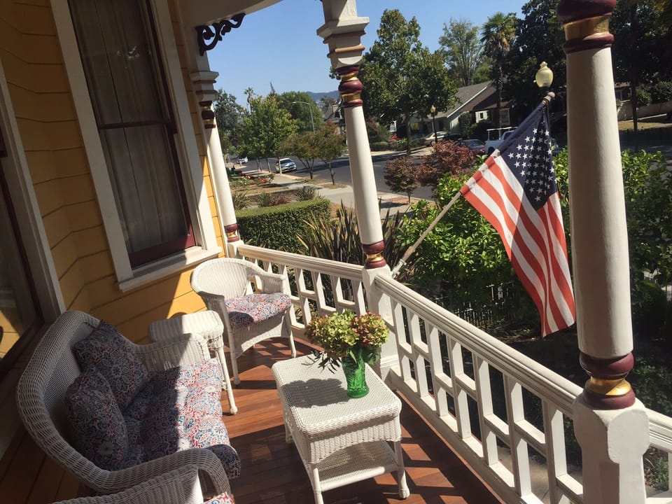 Relax and daydream with a glass of wine on the sun filled Front Porch....