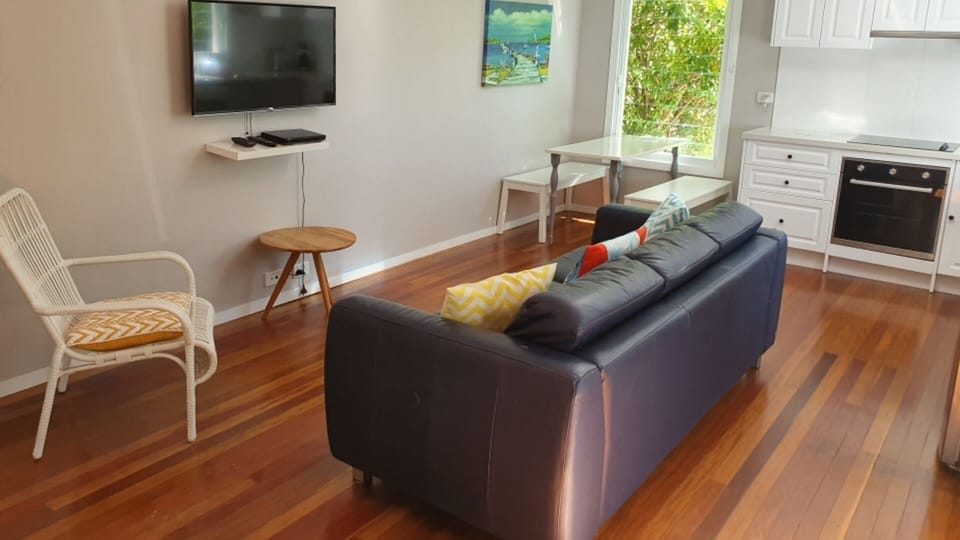 Combined kitchen, living studio space. Air conditioning, TV. Opens to deck.