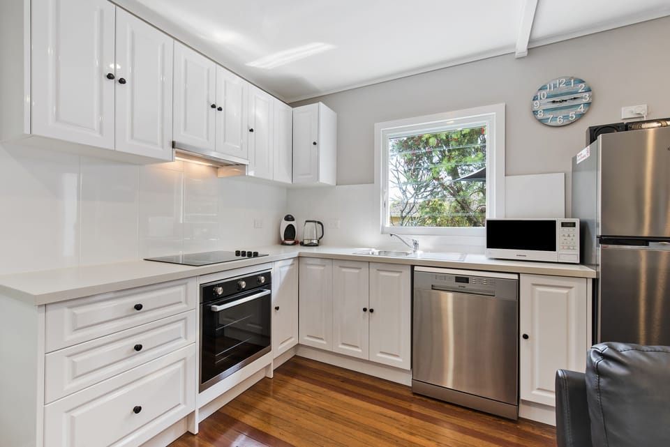 Electric oven and stovetop. Microwave. Dishwasher. Full fridge.