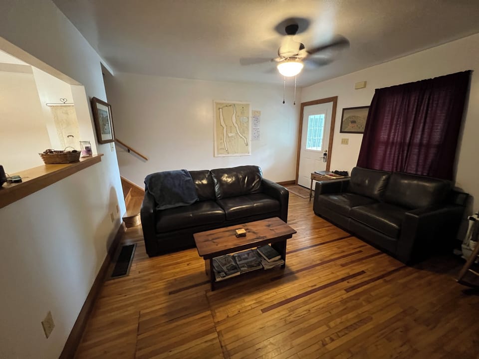 Living room with queen sleeper sofa in GH South, the two bedroom apartment
