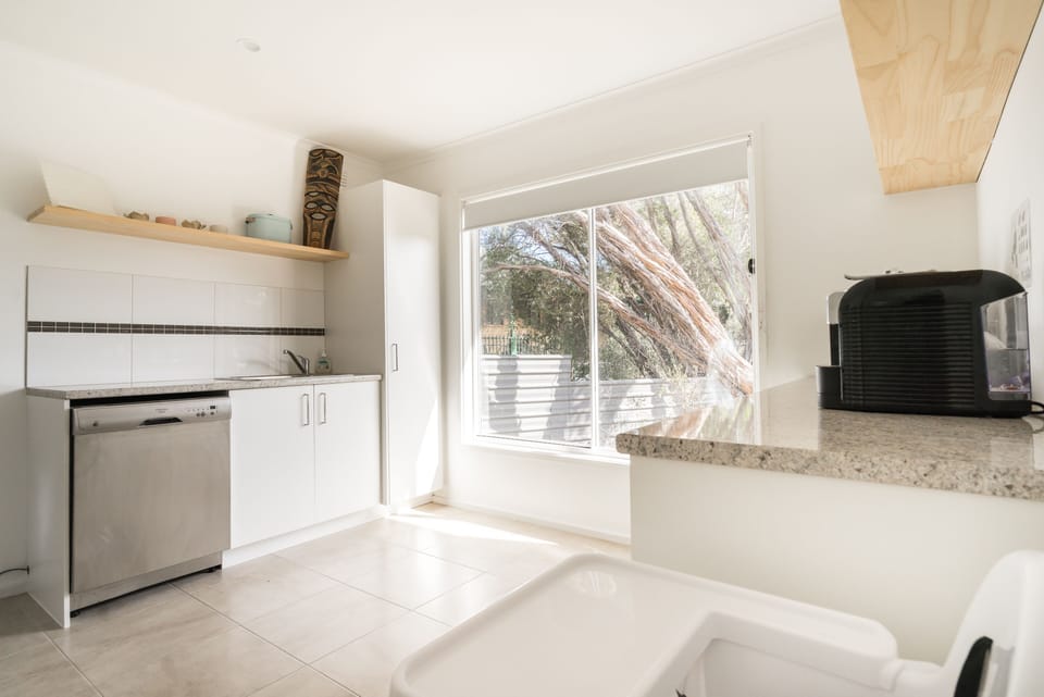 Beautiful and bright laundry and butlers pantry
