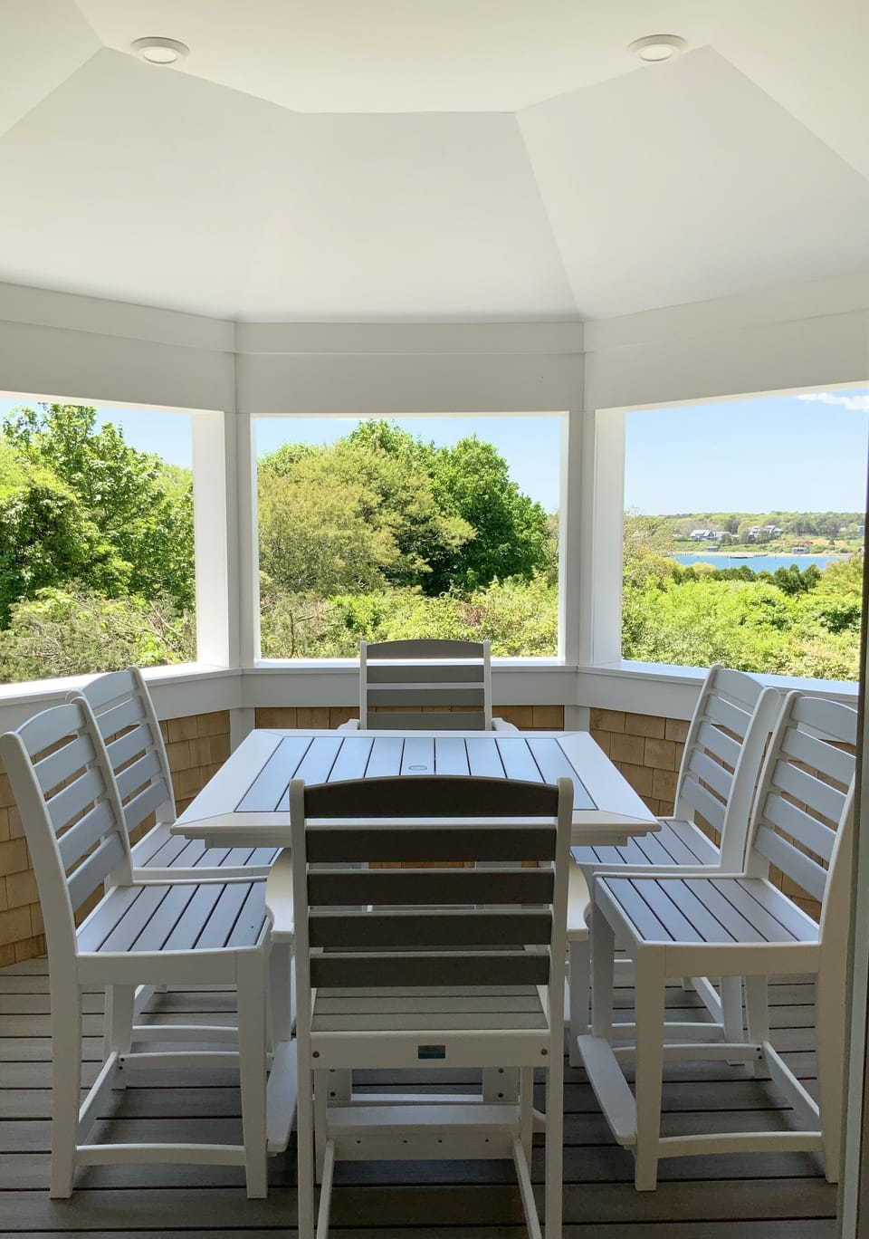 Covered Harborview Porch for outside dining off Living Room.