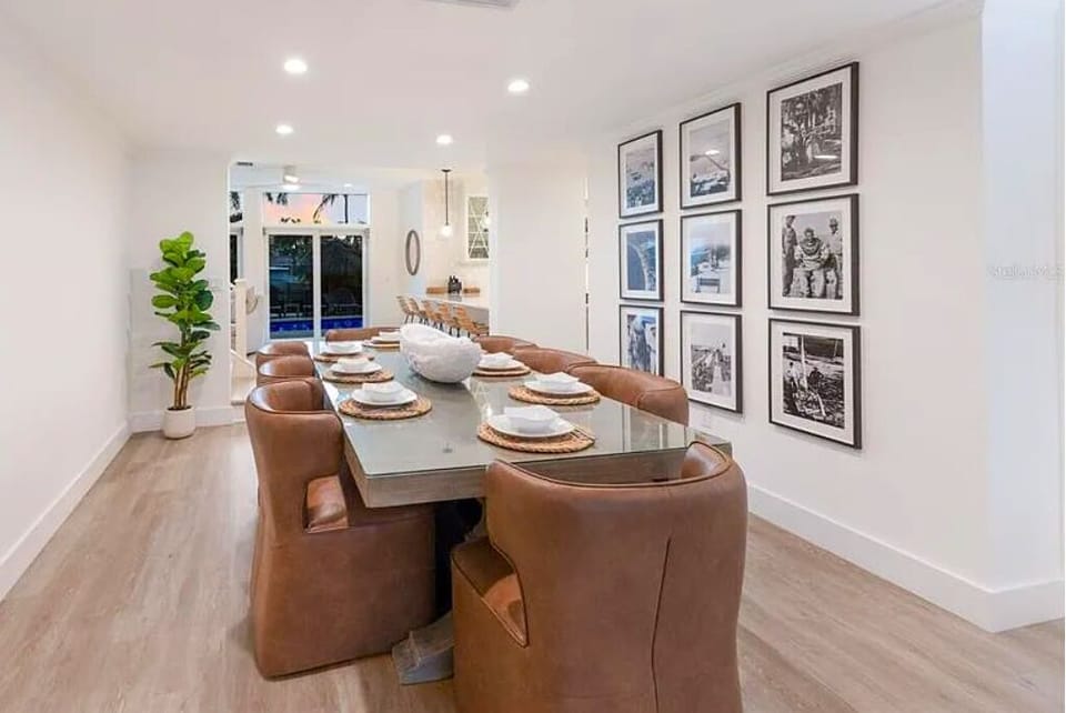 Dining Room that seats 8 very comfortably with 6 more at the kitchen bar