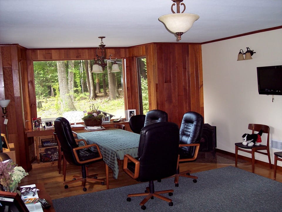 Hardwood floors and wood paneling throughout the house