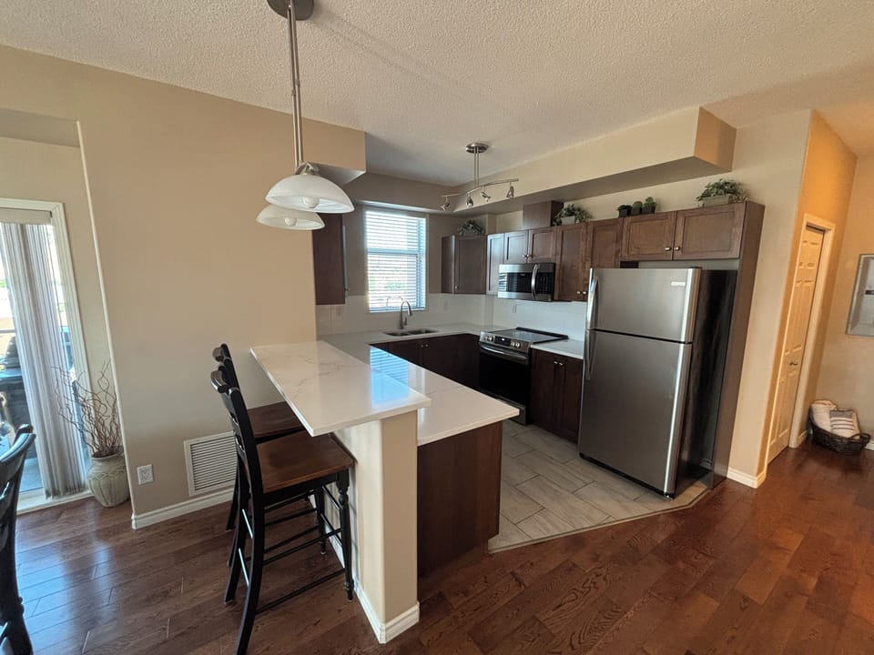 Fully Stocked Kitchen with Quartz Countertops