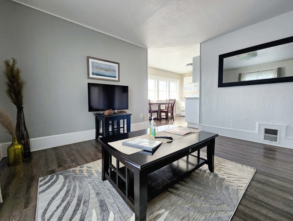 Ample living room with ROKU streaming service.
