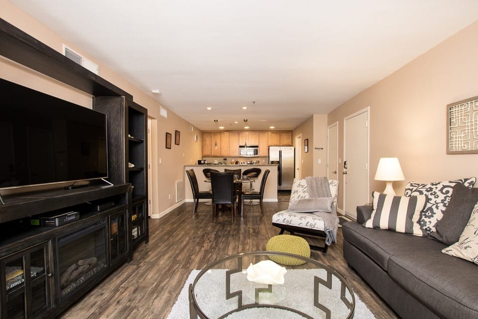 Living room with a 55" Smart TV, Netflix and beyond the basic cable channels.