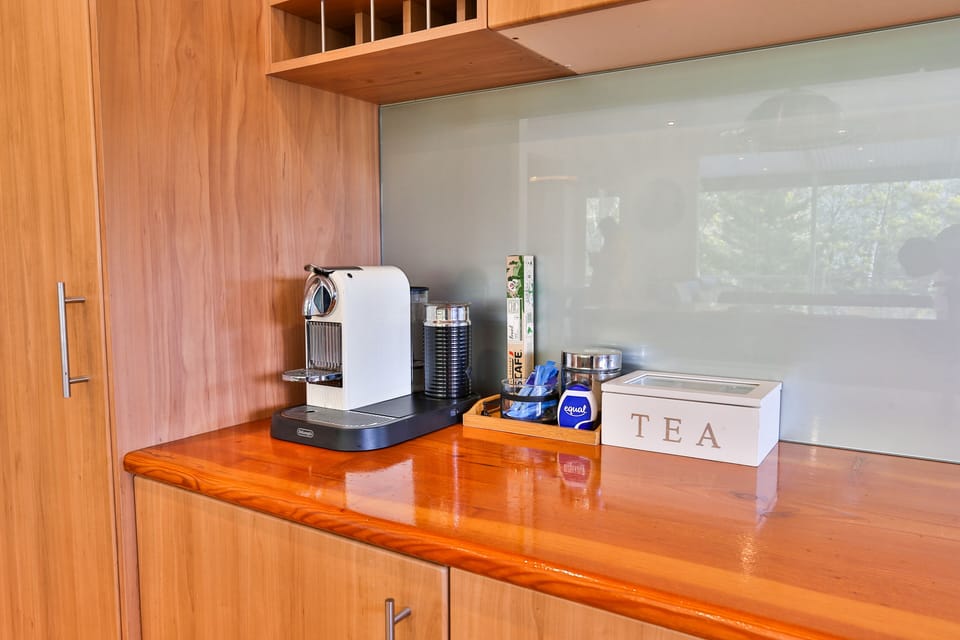 Nespresso Coffee Machine.
One sleeve of coffee pods is provided.