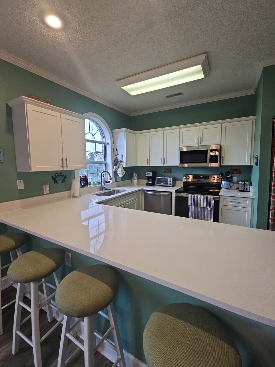 Newly renovated kitchen.. new countertops, cabinets, and appliances.