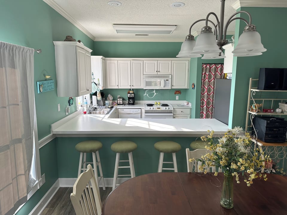 Kitchen with new paint (new appliances NOT yet installed). 