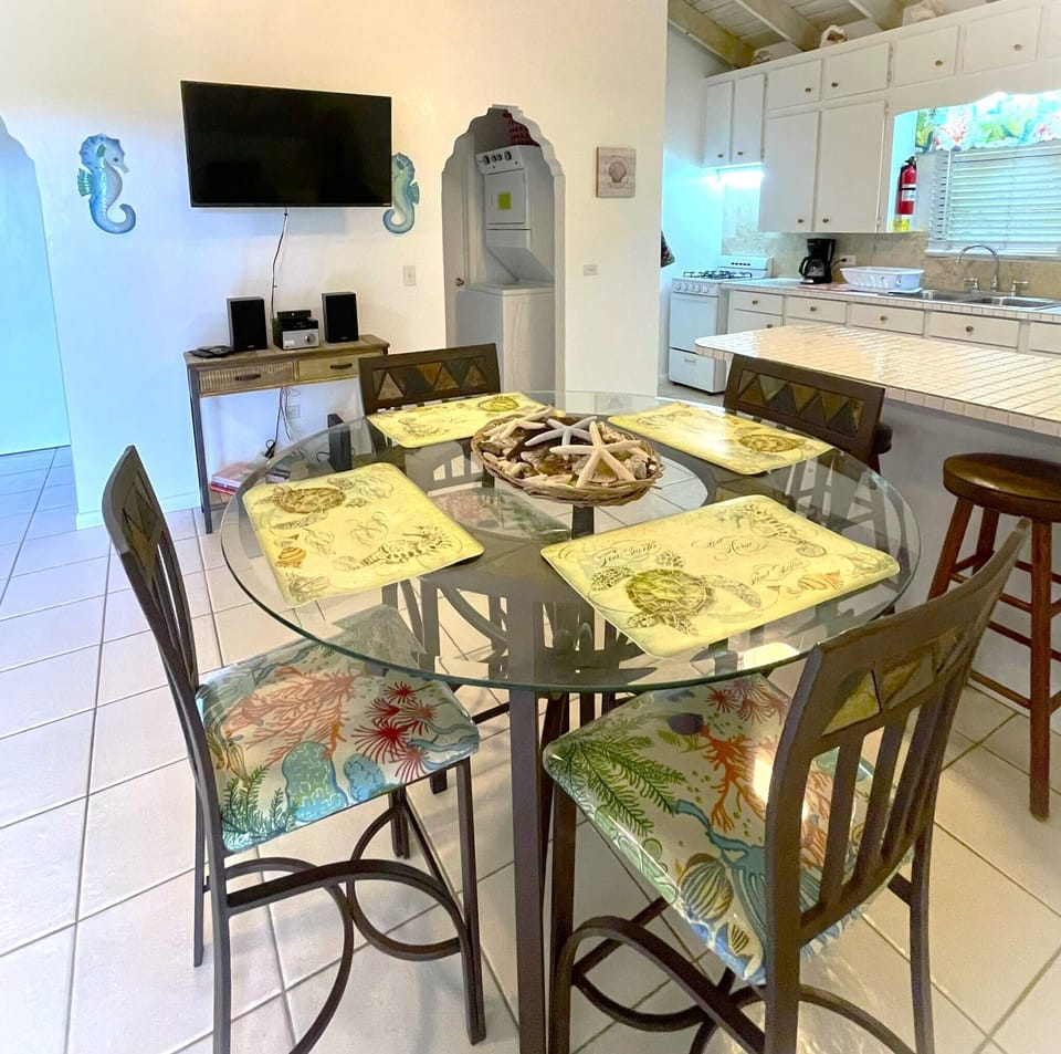 Dining area with superb views.  (4 chairs + 2 counter stools) 