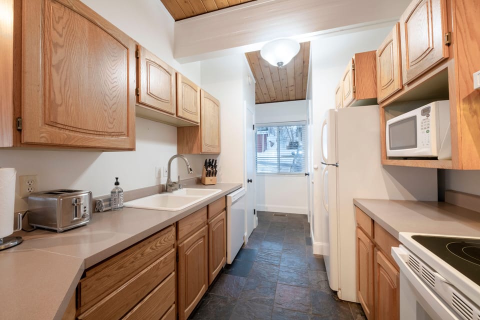 Fridge, dishwasher, microwave, oven, cook top, K-Cup coffeemaker, toaster, etc