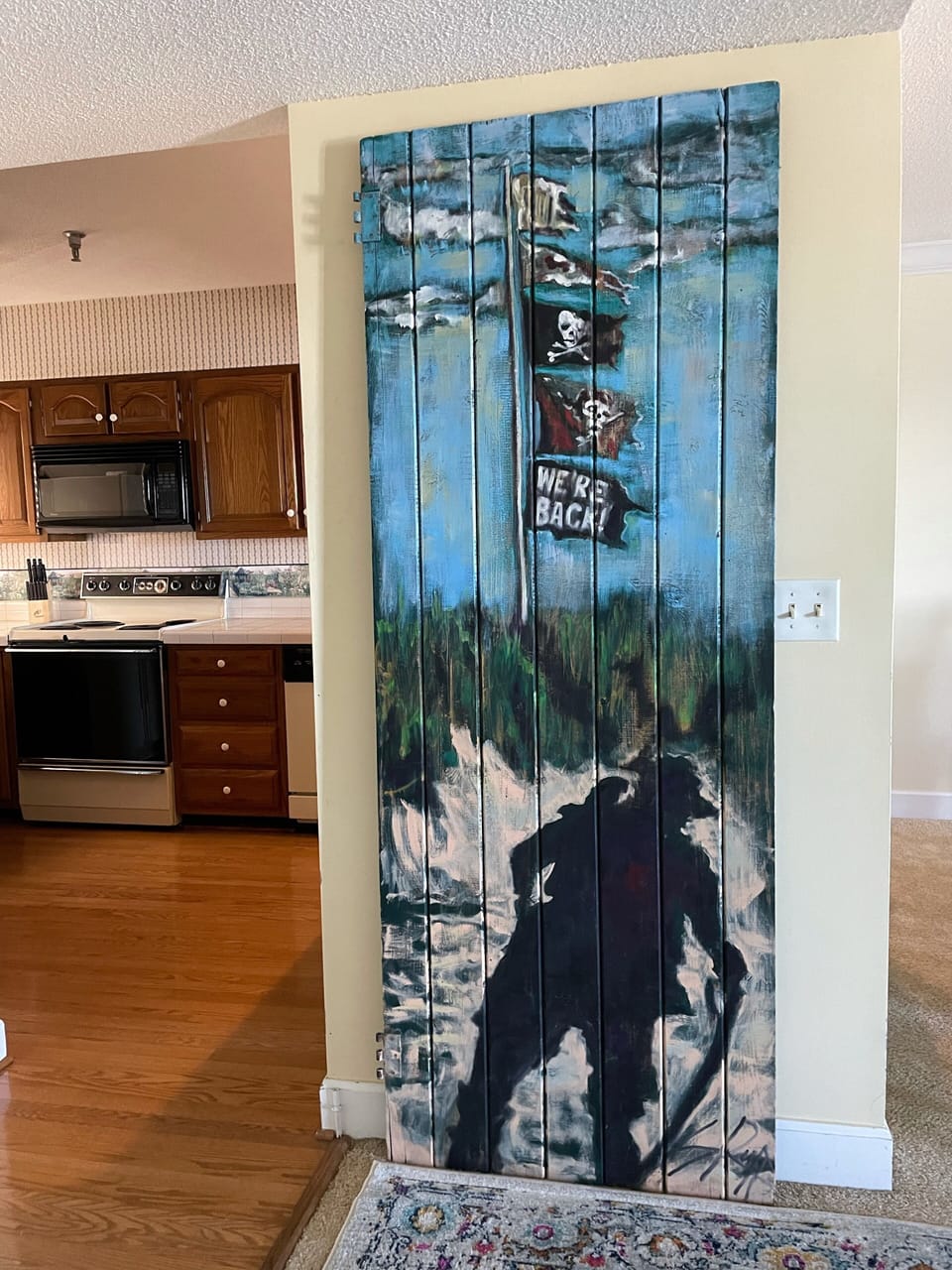 Local art work throughout the condo. 