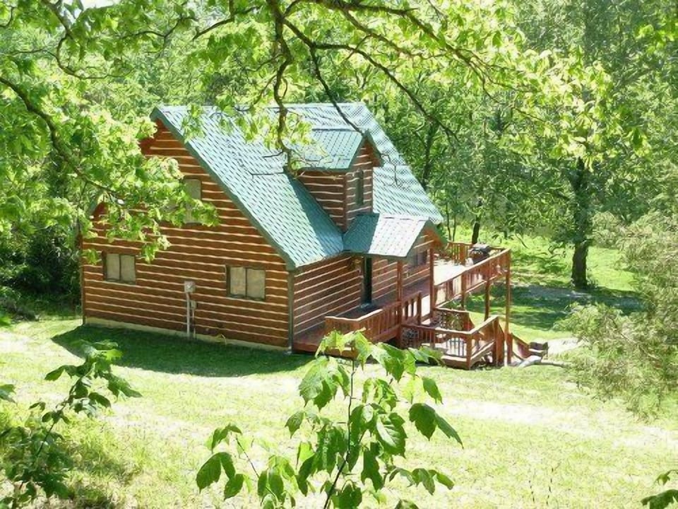 Back view of cabin showing Shenandoah River directly in front of cabin.