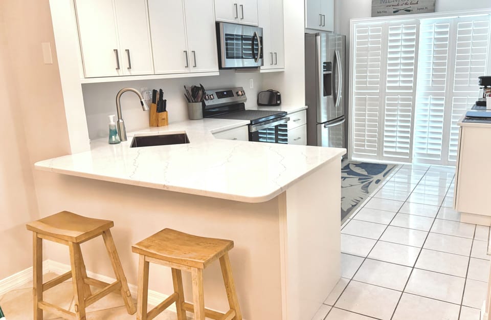 Brand new remodeled kitchen. New cabinets, quartz countertops and appliances.
