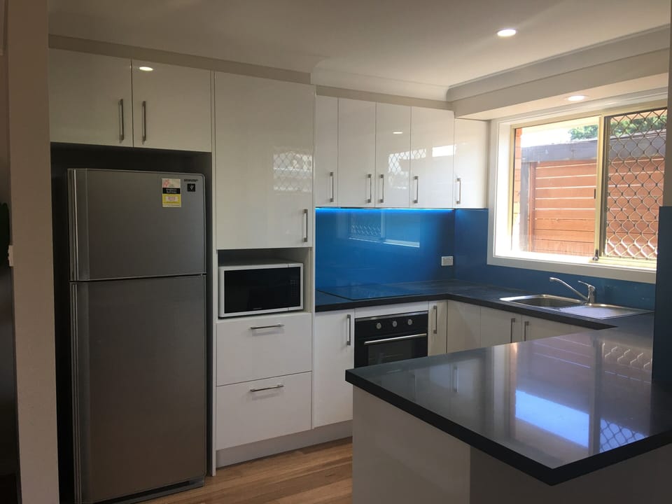 Modern kitchen with stainless steel appliances
