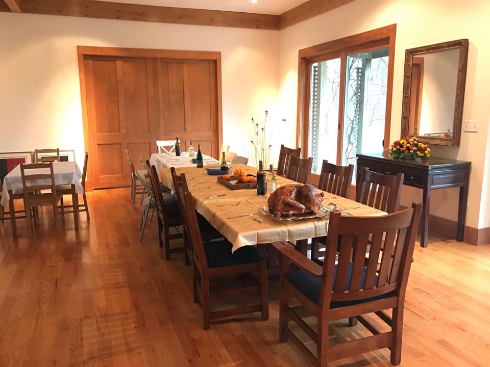 Dining area. An additional table can be added to accommodate a large groups