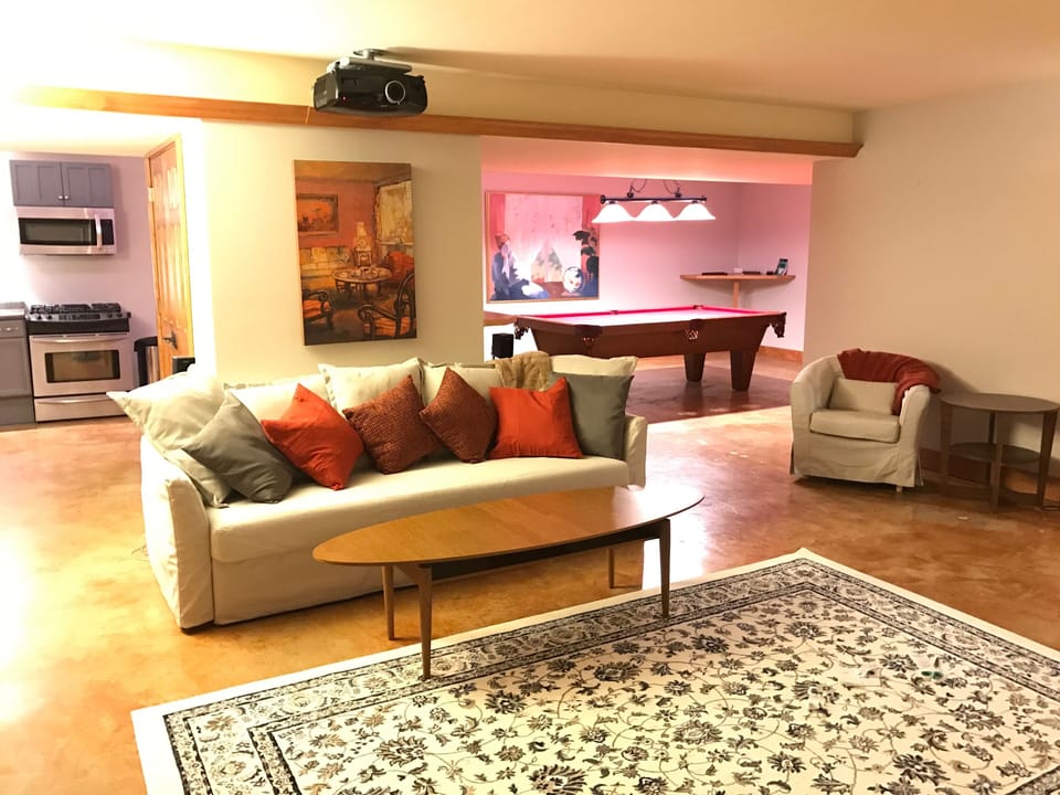 The basement has a sofa sleeper and a pool table (can be converted to ping pong)