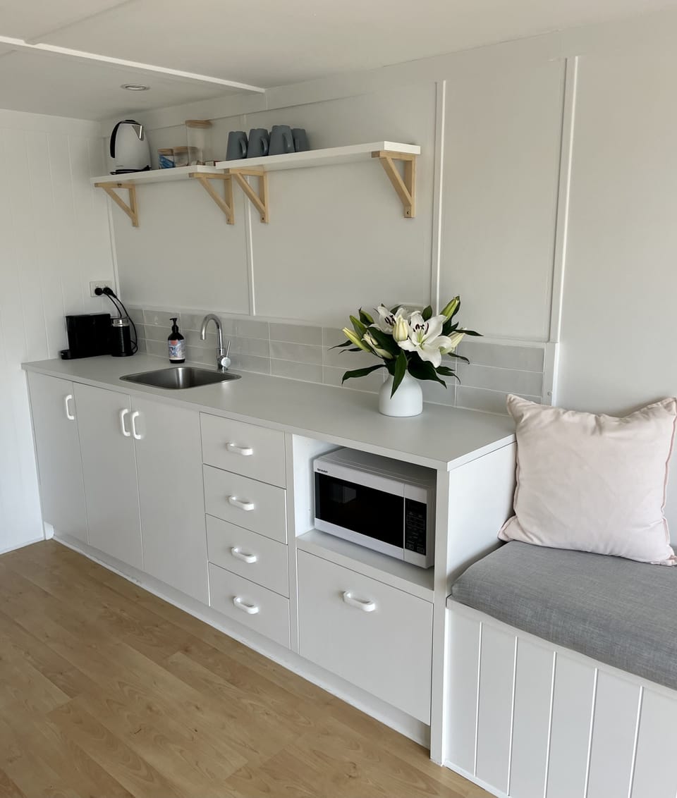The kitchenette downstairs has a fridge plus Nespresso coffee, microwave etc.
