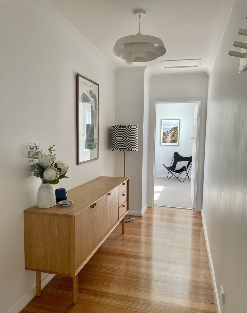 Stylish touches add to the relaxed mid century feel of the house.