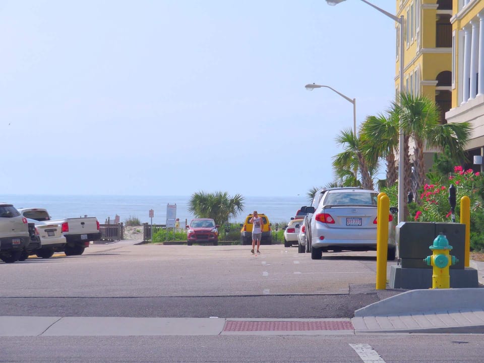 Beach Access down the public access road and cross walk