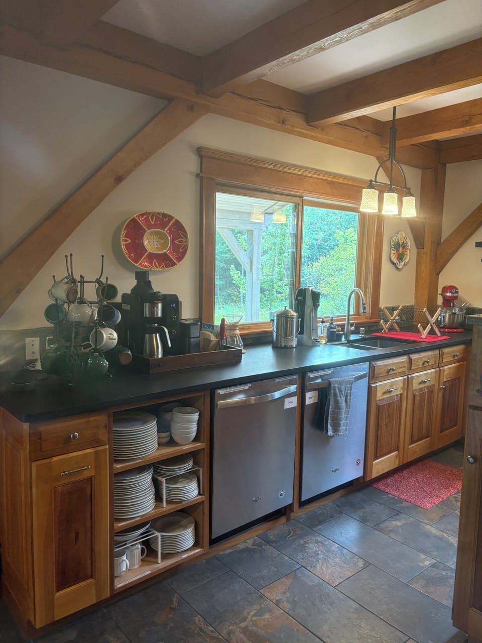 Looking into the kitchen from the dining room.  Coffee bar and 2 dishwashers.