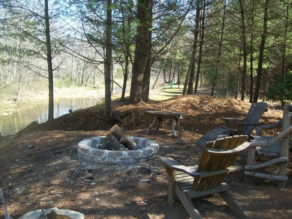 Roast marshmallows over the fire pit located a stones throw from the river