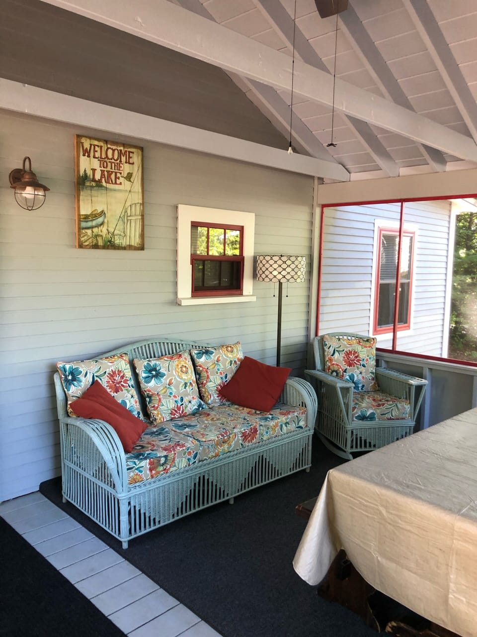Large screened porch, with comfy couch, 2 side chairs & table with lake view