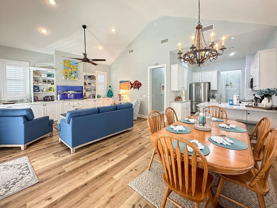 Enjoy seamless flow in the open-concept living area, with sight lines that connect the living room, dining space, and kitchen.