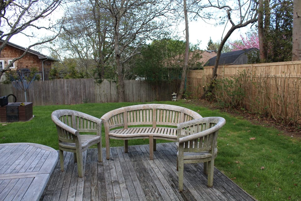 Backyard patio with teak furniture