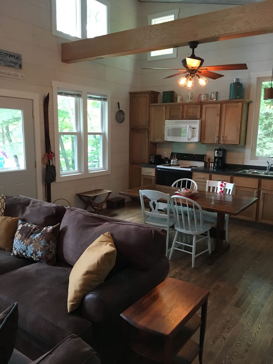View of kitchen area... note 2 ceiling fans in this main room.