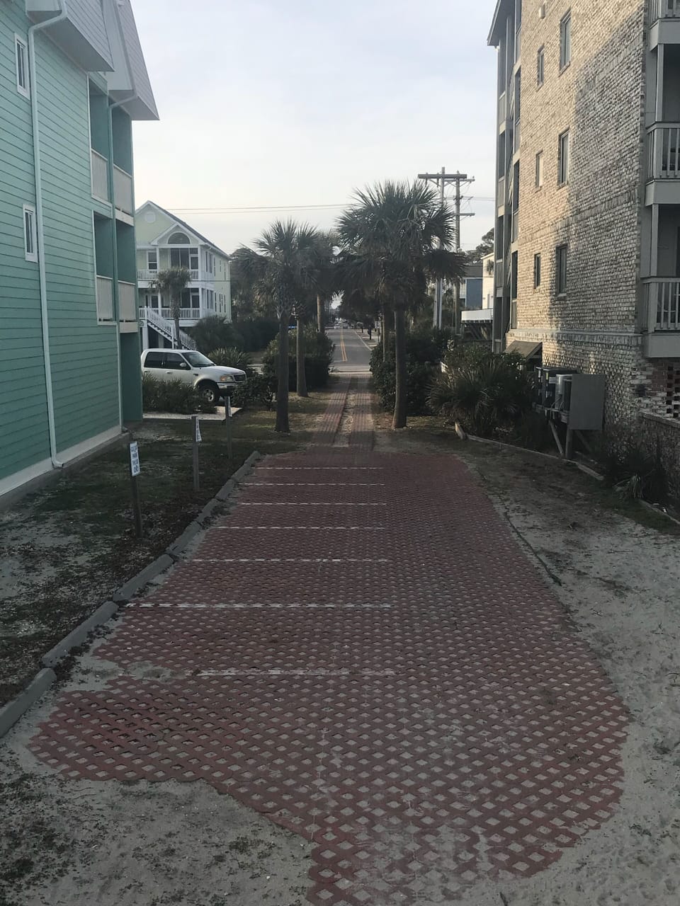 Golf cart parking at public access point. 
