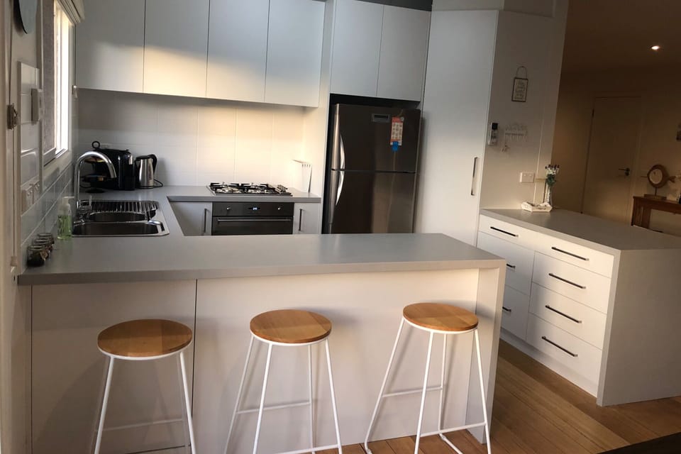 Modern kitchen with stainless steel appliances 