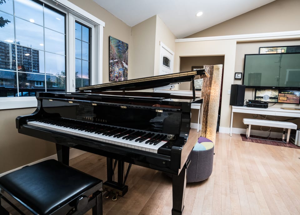 Front Entrance, Vaulted Ceilings and 6'10" concert grand piano